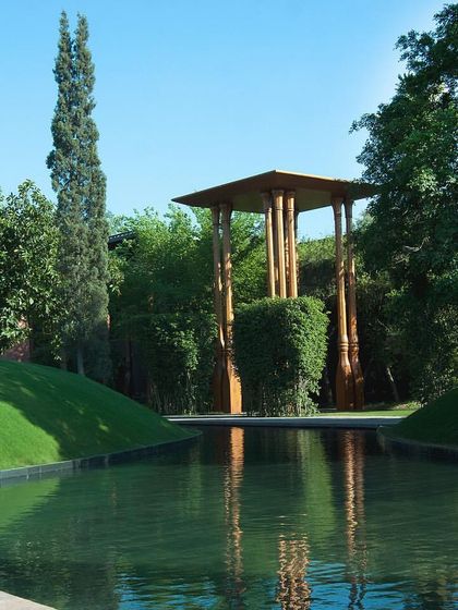 The lush greenery and calm waters are the heart of The Roseate. This view of the yoga pavilion shows how we have integrated wellness spaces into the natural landscape.