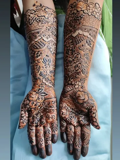 A beautiful example of a floral bridal design with initials hidden within the pattern.