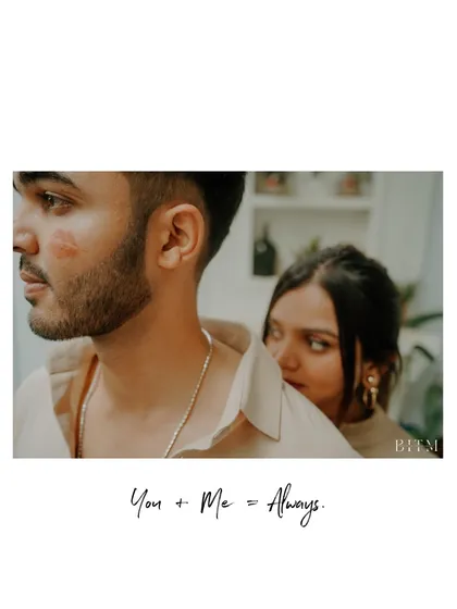 A playful and intimate moment captured from behind. The lipstick mark on his cheek adds a touch of spontaneity and storytelling to this stylish pre-wedding photo.