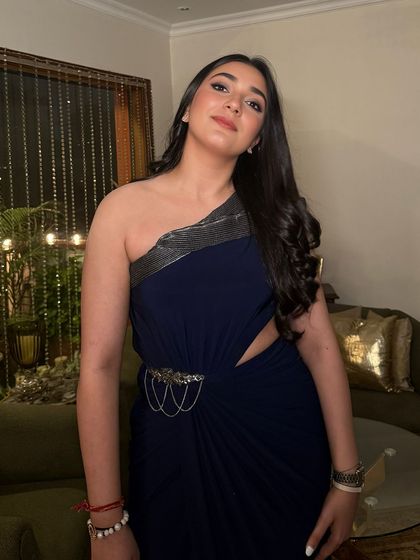 The many moods of this crazy one. A fun shot showing off the bronzed glam look, which is versatile enough for both posed photos and candid moments.