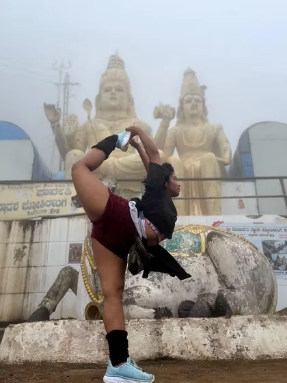 A deep backbend pose in front of the Shiva statue at Shivagange. This was taken during a trek that tested my physical limits post-surgery, a powerful moment of reconnecting with my body and spirit.
