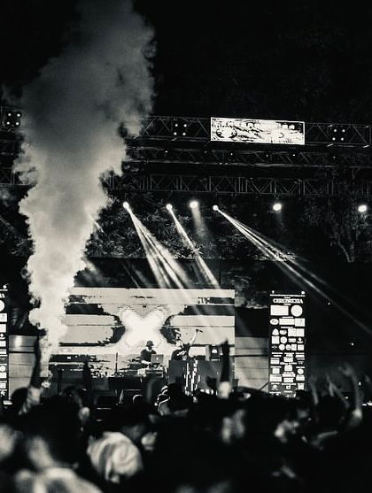 The full stage setup in Patna, with smoke cannons firing during the set.