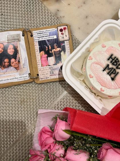 A handmade memory book paired with a cake and flowers makes for the perfect birthday surprise. It’s a celebration of friendship and all the sweet moments you've shared.