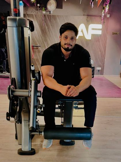 A full shot of me resting between sets at Anytime Fitness.