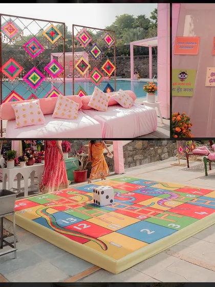 The Haldi was filled with fun and games. We included interactive elements like a giant snakes and ladders board and colorful seating areas with thread-work backdrops.