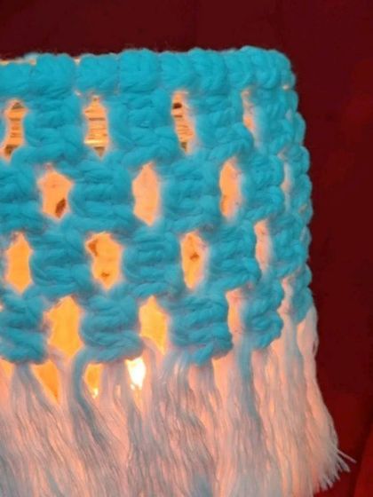 Another glowing macrame jar lantern, this time with a two-toned fringe. The light filtering through the knots is just magical.