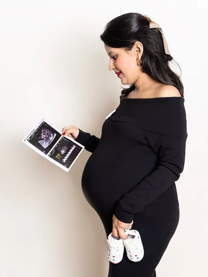 The first hello. I always encourage bringing your ultrasound pictures to the shoot. It’s the first portrait of your baby, and it makes the memory we are creating together even more precious.
