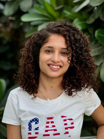 Look at that smile. She is radiating confidence with her freshly defined and colored curls. Healthy curls are happy curls.