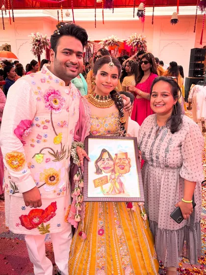 Gifting a custom caricature to the happy couple on their wedding day. It’s a unique present that adds a touch of fun and personality to their big celebration.