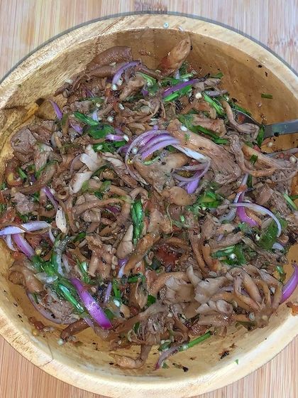 A simple and earthy oyster mushroom chutney. I just boil the mushrooms and then mix them with roasted chillies, tomatoes, salt, and freshly chopped onions and chives.