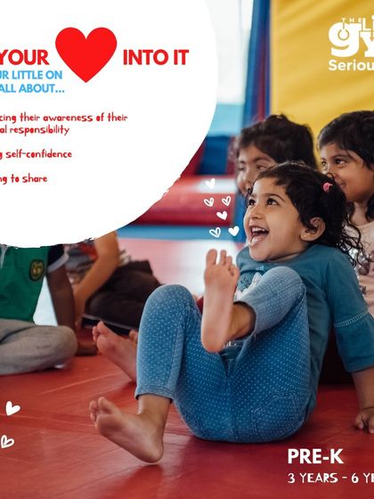 Laughter and friendship are at the heart of our Pre-K classes. Here, a group of children share a happy moment, learning important social skills like sharing and cooperation.