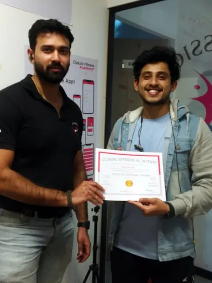 Celebrating a student's commitment to professional education. Holding this certificate means he has the foundational knowledge to build a successful career as a personal trainer.