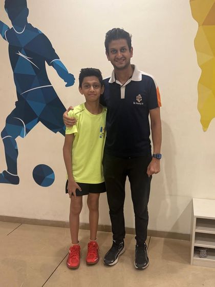 Ansh Chogle, our under-13 champion, with his coach after winning the CNS Badminton Tournament. We tailor our coaching to fit the specific needs of each age group.