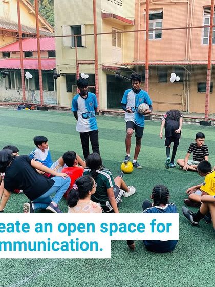 We create an open space for communication. In this picture, our coaches are talking with a group of older kids, fostering a sense of community and mutual respect.
