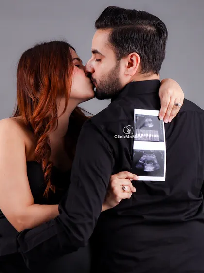 The first hello. Bringing your sonogram to the shoot is a wonderful way to make your session deeply personal. This pose beautifully incorporates the very first picture of your baby into your maternity portraits.