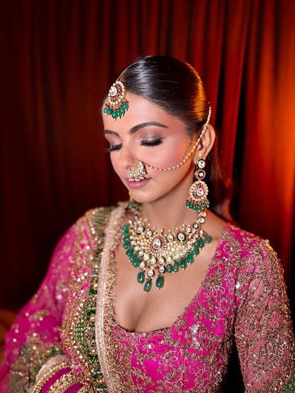 Another angle of this regal bridal look. The skin has a beautiful, healthy glow that looks incredible under lights.