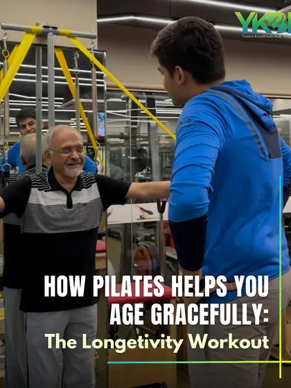 This image of an older client smiling while working on the Cadillac showcases the joy in movement. My goal is to help you age gracefully with workouts that build strength and confidence.