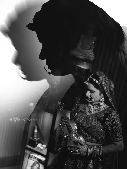 A creative black and white double exposure portrait of the bride. This artistic technique blends her silhouette with her portrait, creating a timeless and thought-provoking image that stands out from traditional wedding photography.