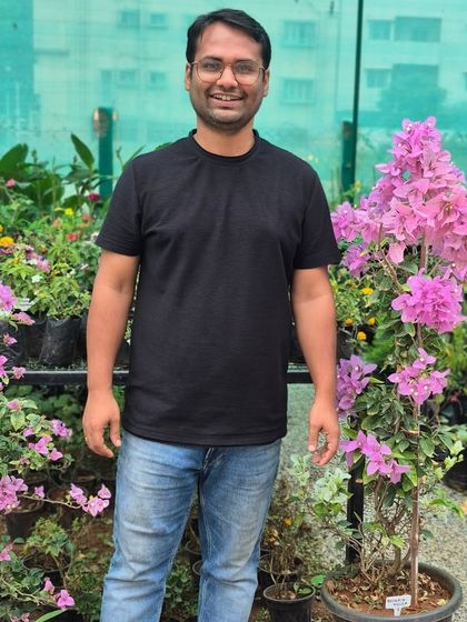 My partner, the other half of Urban Jungle, standing proud in our garden center. We've built this dream together, and his support has been the foundation of this entire journey.