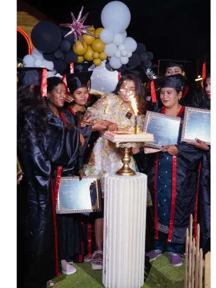 Surrounded by my students, cutting the graduation cake. These are the moments I cherish as an educator.