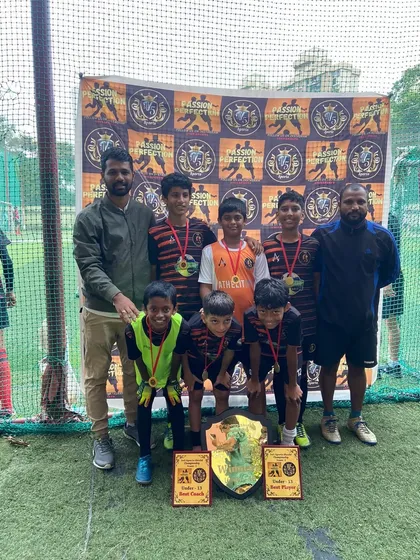 Our U13 team celebrating their championship. We challenged them by playing in a higher age group, and they rose to the occasion.