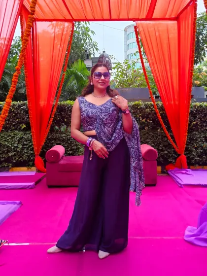 Ready to host a Mehendi function, dressed to match the vibrant and colorful theme. The energy starts with me.