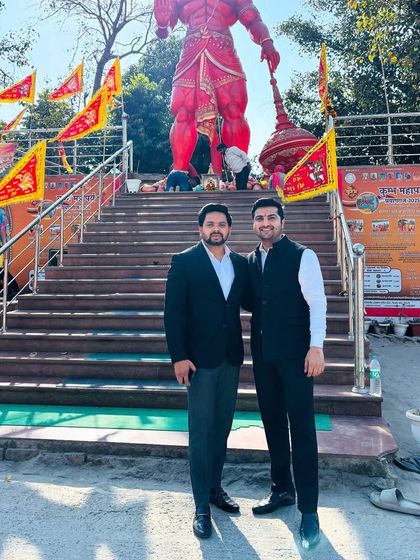 With my brother at a temple. Our shared values and spiritual grounding strengthen our bond and our work together.