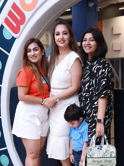 A lovely group photo at our entrance. We love being the destination for family outings and creating lasting memories.
