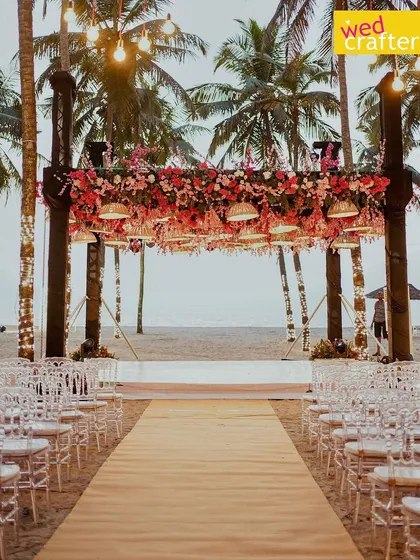 This is what dream beach weddings are made of. I designed this mandap on the sand, using woven lamps and lush pink florals to complement the natural beauty of the Kerala coastline, with the ocean as the ultimate backdrop.