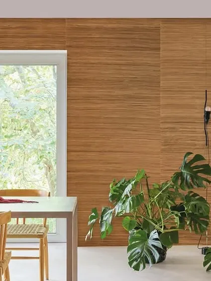This wallcovering from the Intuition collection showcases the beauty of natural wood grain. The horizontal panels create a warm, modern, and minimalist look, perfect for a dining area with lots of natural light.
