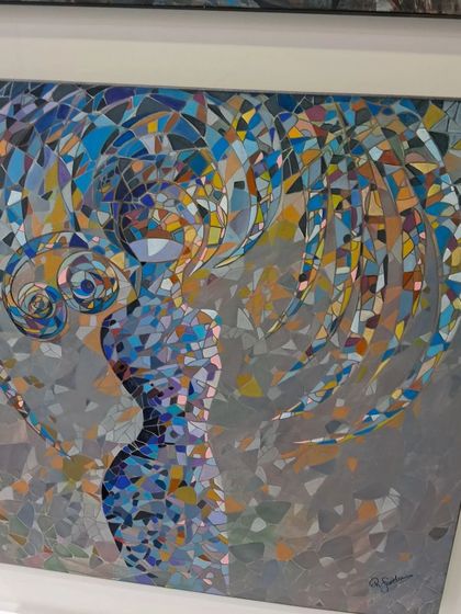 An abstract mosaic of a woman's silhouette by Roudaina, demonstrating her mastery of the medium.