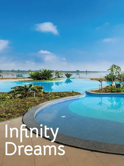Imagine your dreams floating on water. Our stunning infinity pool at Kabini overlooks the serene river, offering the perfect spot to cool off and unwind.