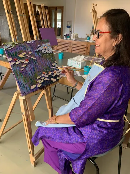 Art is a lifelong journey, and it is never too late to start. This student in our adult workshop is finding her flow, recreating the serene beauty of Claude Monet's water lilies. Our adult classes offer a relaxing escape to learn new skills in a friendly, supportive setting.