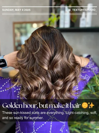 Golden hour, but make it hair. These sun-kissed curls are everything, with light-catching highlights that are soft and so ready for summer.