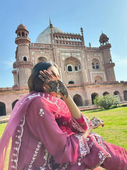 A beautiful shot of my mehndi work in front of a historic monument.