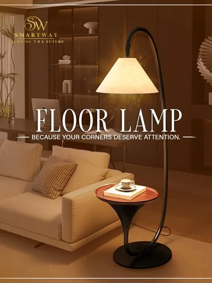 Don't forget the corners of your home. A floor lamp like this one, with its own little table, is both practical and beautiful. It provides a warm, cozy light for reading or relaxing next to the sofa.