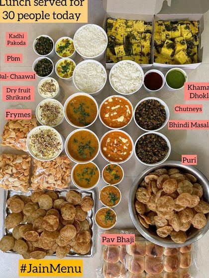 A delicious and varied Jain lunch menu I served for 30 people. It included classics like Pav Bhaji, Khaman Dhokla, and Bhindi Masala, along with fresh puri and chutneys.