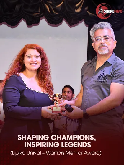 Our founder, Lipika Uniyal, receiving the Warriors Mentor Award. This recognition highlights her dedication to shaping the next generation of martial artists and empowering individuals through her coaching.