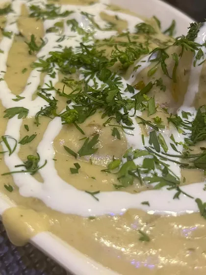 A close-up of our Chicken Barra, showing the creamy texture and tender chicken pieces. It's a dish that appeals to all palates.