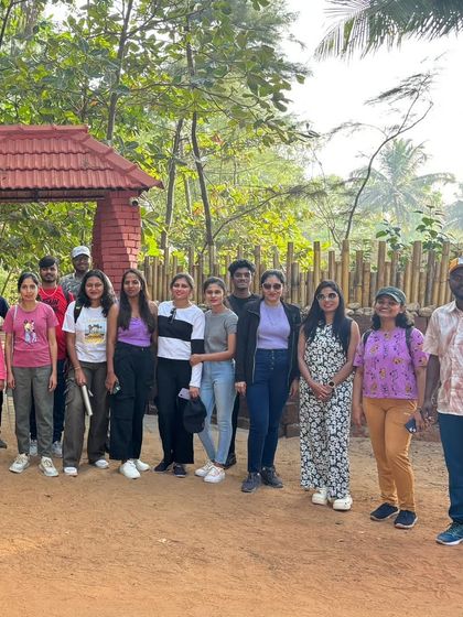 A group photo at the start of the trail, ready for a day of beach hopping and hiking.