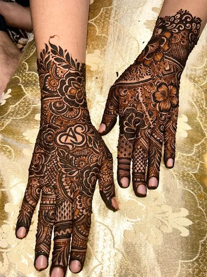 A personalized design with the initials 'AS' elegantly placed in the center of an intricate pattern.