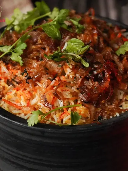 Behold our famous Handi Biryani. This isn't just a dish; it's an experience. We layer fragrant basmati rice with fresh vegetables and aromatic spices, slow-cooking it to perfection to create a healthy version of this classic comfort food.