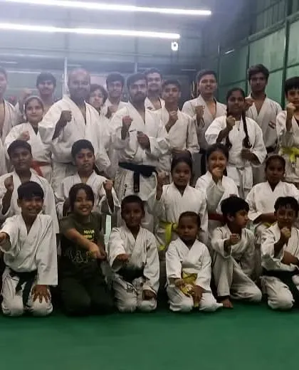 A group photo of our students at the Rackonnect facility after successfully completing their belt grading exam.