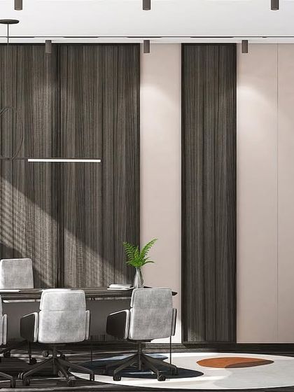 Inspired by the fluidity of waves, this office design concept uses curved partitions and dark wood panels to create a dynamic and sophisticated workspace. The layout is designed to guide movement and create distinct functional zones.