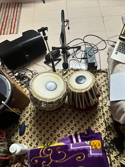 My home recording setup. With my tablas, laptop, and notes, I am always ready to practice, compose, or lay down ideas for a new project.