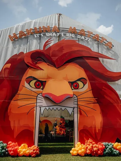 This larger than life lion head served as the grand entrance to a Lion King themed first birthday party. I love creating these high impact moments that set the tone for the entire celebration from the moment guests arrive.