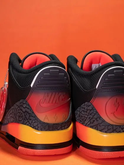 The heel view of the Jordan 3 J Balvin 'Rio', showing the translucent heel tabs with the Nike Air and J Balvin smiley logos over a beautiful color gradient.