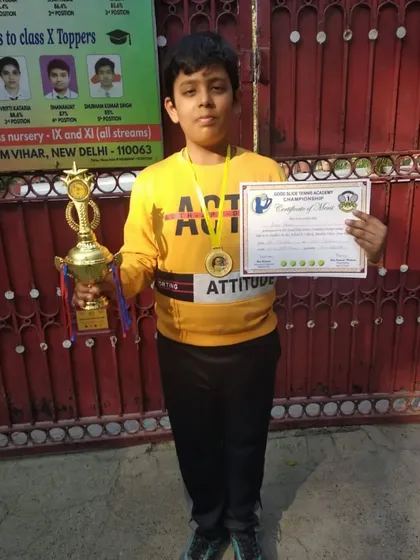 Aadi, runner-up in the Under-10 category, with his trophy and medal. He showed great fight and skill throughout the tournament.