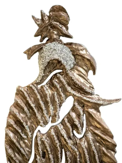 Another detailed view of "The Bronze Guardian," highlighting the intricate textures created from upcycled paper on a wood base.