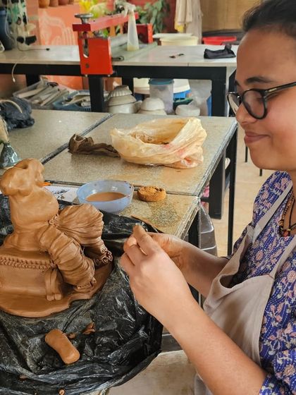 It has become a yearly ritual to make our Ganesha idols together. The whole studio gets filled with positive and spiritual vibes. Here, a participant carefully adds details to her sculpture.